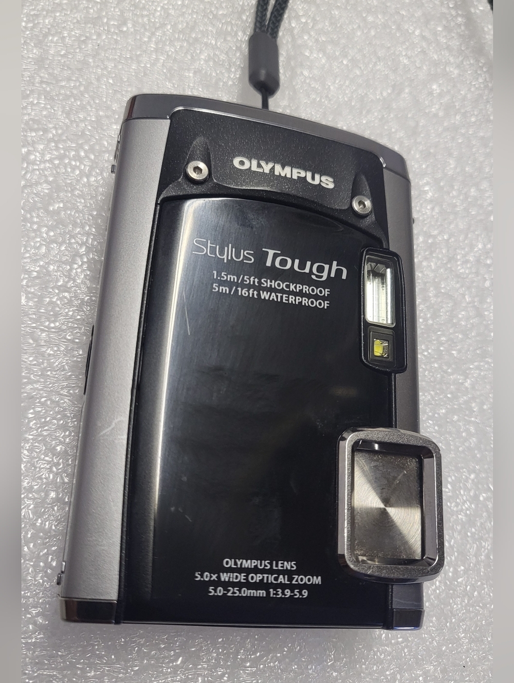 Olympus Stylus Tough 6020 14 MP Digital Camera w/5X wide angle zoom With Battery